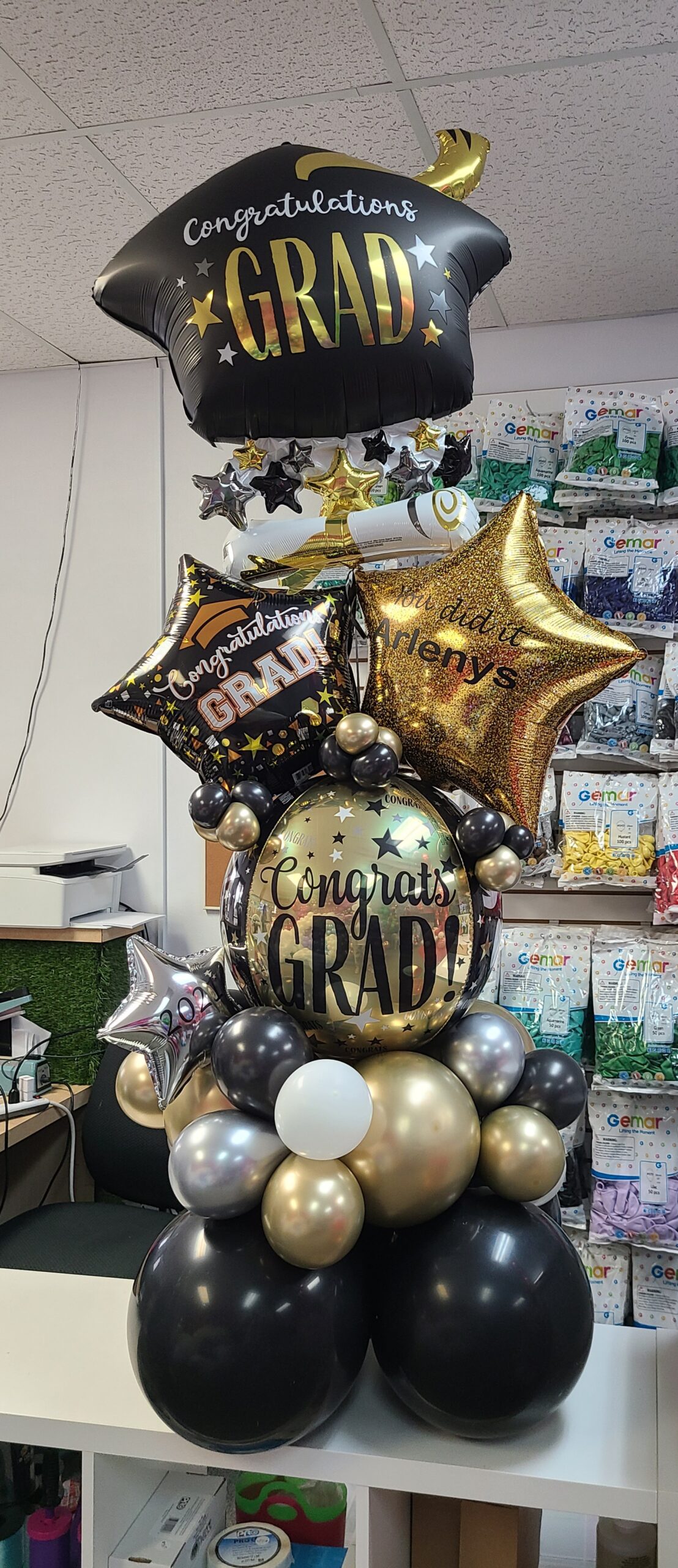 Grad balloon bouquet delivery from Party Now Tampa